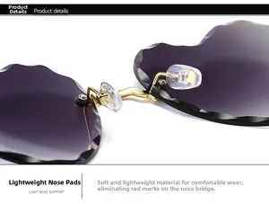 Detail of soft silicone nose pads on rimless gradient heart sunglasses with gold bridge