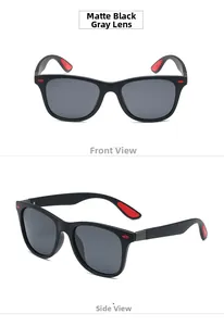 Detail view of matte black sports sunglasses with grey lenses and red accents