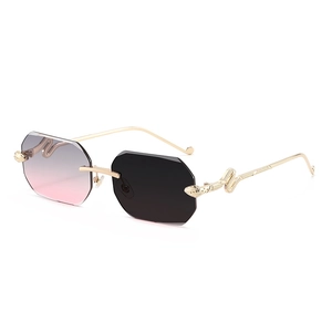 Asymmetric rimless octagonal sunglasses with gold snake-patterned metal temples
