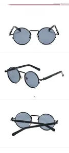Detail of steampunk round sunglasses with black metal frame and unique spring temple design