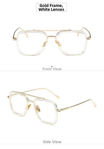 Detail of vintage gold metal square frame glasses with double bridge and clear lenses