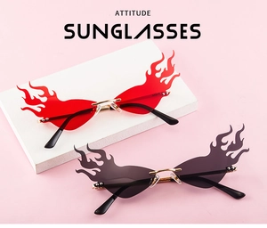 Detail of flame-shaped rimless sunglasses with gradient lenses and golden metal frame