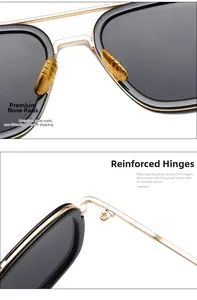 Detail of gold metal nose pads and reinforced alloy hinges on polarized sunglasses