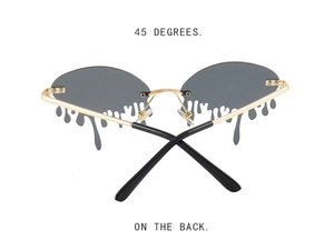 Detail view of the 45-degree back structure on the unique gold tear-shaped sunglasses