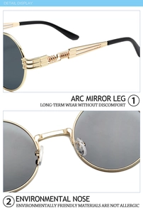 Detail of vintage round sunglasses showing golden metal temples and comfortable nose pads