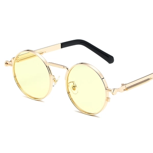 Retro steampunk round metal sunglasses with yellow lenses shown in a 45-degree angle