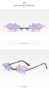 Detail view of C8 bat-wing rimless sunglasses with purple mirrored lenses and metal frames