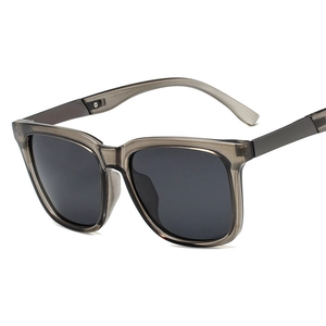 Polarized oversized sunglasses for men with grey translucent frames and dark black lenses