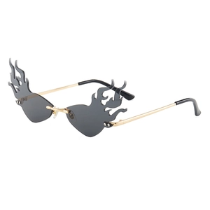 Trendy flame shaped rimless sunglasses with grey lenses and gold metal temples