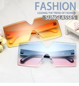 Macro detail of rimless sunglasses hinge with size markings and gradient lenses