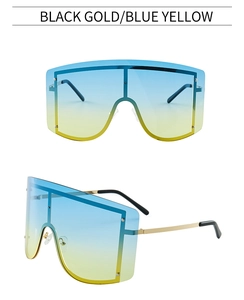 Vorder- und Seitenansicht der randlosen Shield-Sonnenbrille mit blau-gelbem Verlauf