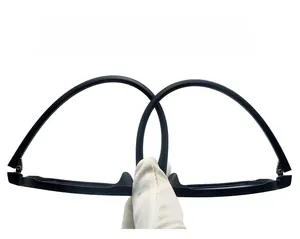 Close-up showing the flexible and durable TR90 temple of these matte black glasses frames