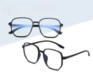 Detail view of large black square TR90 eyeglass frames with blue light blocking lenses
