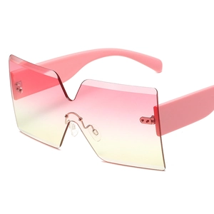 Oversized rimless sunglasses with pink-yellow gradient lenses and wide pink temples