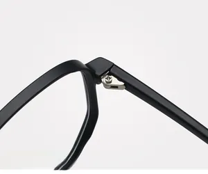 Macro shot of durable metal hinges and reinforced screws on black TR90 eyewear frames
