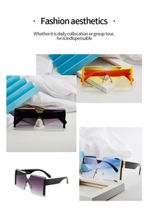 Détail de lunettes de soleil géométriques sans monture en orange, violet et dégradé bleu