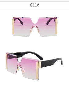 Détails de lunettes de soleil sans monture avec verres dégradés roses et branches dorées