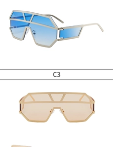 Close-up of geometric oversized sunglasses with gradient lenses and metal frames