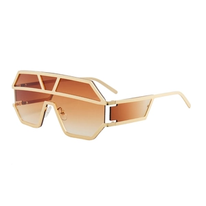 Futuristic oversized geometric sunglasses with gold metal frame and gradient lenses