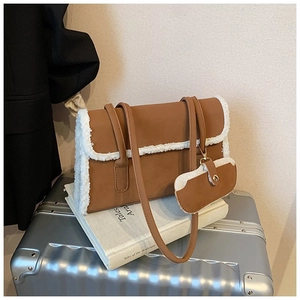 Brown PU leather shoulder bag featuring white fleece trim and a matching mini coin purse