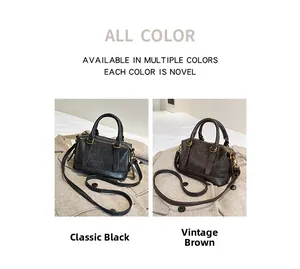 Detail view of black and coffee bowling handbags with bronze metal hardware and straps