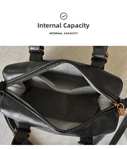 Detail view of the bowling bag interior featuring black and white herringbone fabric lining