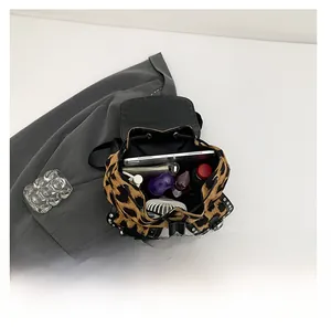 Interior view of leopard print backpack showing spacious capacity for daily essentials