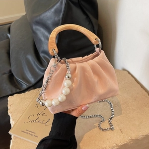 Pink pleated cloud handbag with wooden handle and pearl chain strap for women