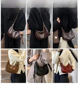 Detail shots of leather half-moon hobo bag in four colors with chain and leather straps