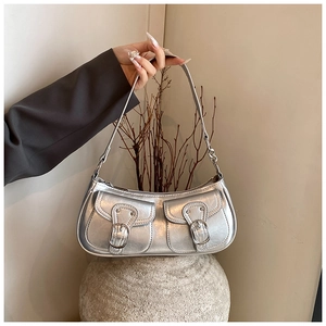 Chic silver metallic baguette bag with distressed texture and double front buckle pockets
