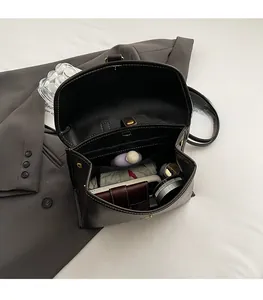 Internal view of the spacious dark brown leather briefcase bag with organized compartments