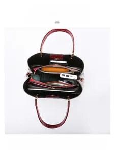 Spacious interior of the plaid tote bag showing compartments for iPad and daily essentials