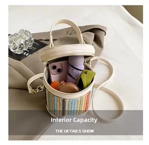 Detail showing the large interior capacity of this woven bucket bag with daily essentials