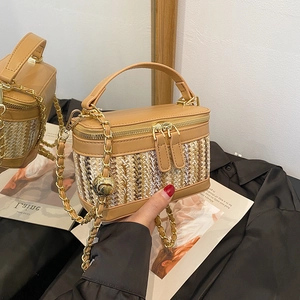 Elegant woven straw and leather small square bag with gold chain and top handle