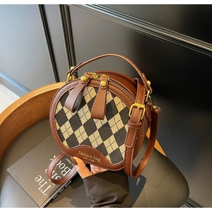 Retro round shoulder bag in brown leather with plaid pattern and fashion bag logo