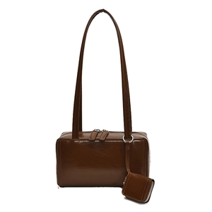 Minimalist glossy brown faux leather shoulder bag with a matching mini coin purse detail