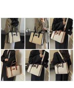 Three-way carry demonstration of contrast trim canvas tote with adjustable wide shoulder strap