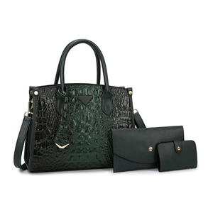 Three-piece dark green crocodile pattern tote bag set with envelope clutch and small wallet