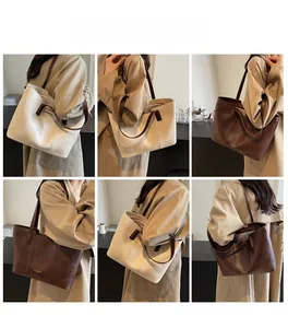 Detail shots showing large faux leather tote bags in cream and dark brown on a model