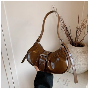 Vintage brown pleated crescent shoulder bag with metallic buckle and glossy finish