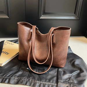 Brown vintage faux leather tote bag with large capacity for commuting and daily use