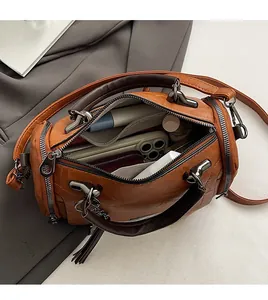 Top view of vintage Boston bag showing large interior capacity and leather texture