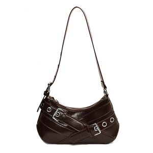Vintage dark brown patent leather hobo bag with silver metal buckles and retro biker style