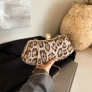 Chic leopard print handbag with pearl clasp and gold chain strap for women