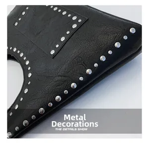 Detail of black textured leather bag with polished silver rivet hardware decoration