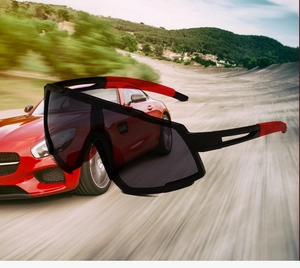 Dynamic view of oversized cycling sunglasses with black frame and red temples