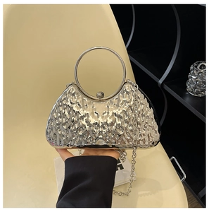 Silver textured evening bag with circular metal handle and chain strap for women