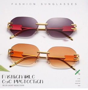 Close-up of frameless sunglasses with purple and orange gradient lenses and gold temples