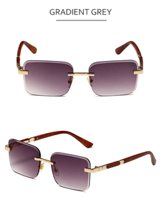 Detail of rimless square sunglasses with gradient grey lenses and wood texture temples