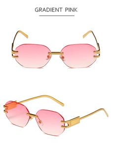 Detail of rimless sunglasses with gradient pink lenses and textured gold metal frames